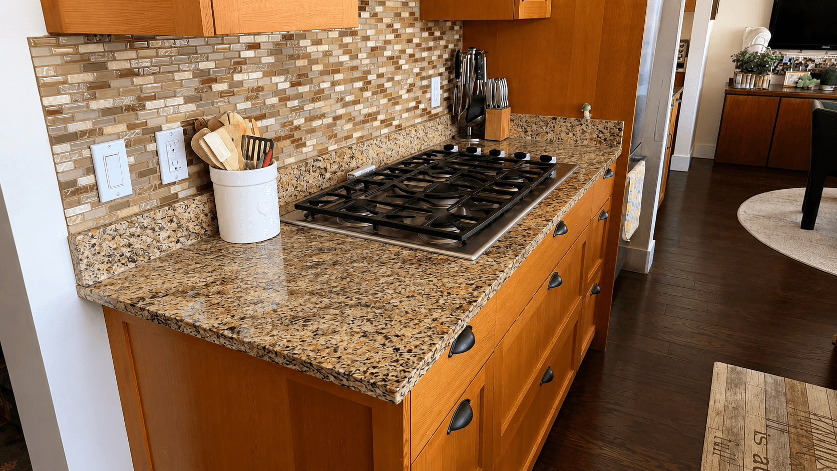 A kitchen cooktop and surrounding counters after cleaning
