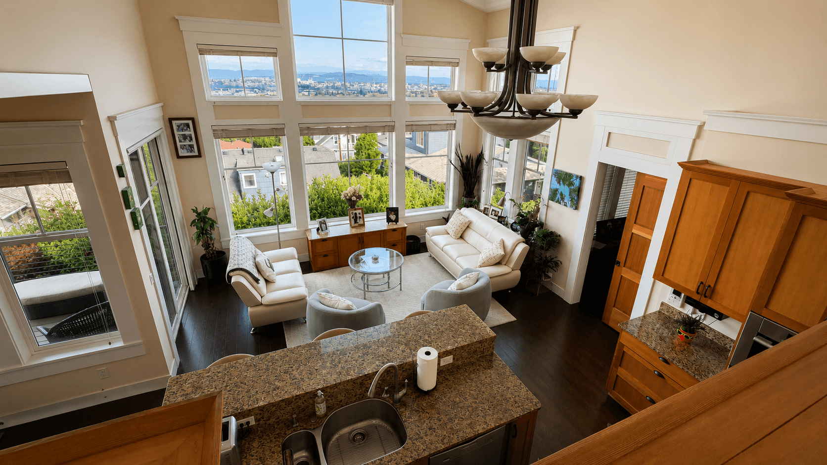 An open-plan West Seattle kitchen and living room after a full-space residential clean